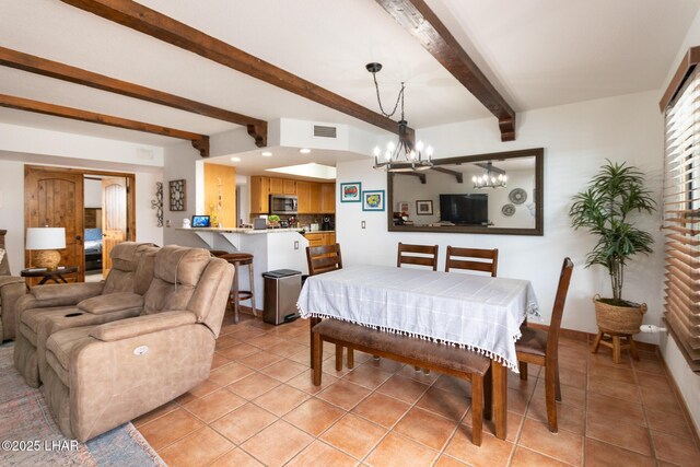 living area with a tile fireplace, light tile patterned floors, beamed ceiling, and recessed lighting