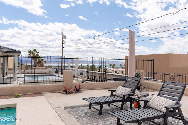 view of patio / terrace with fence