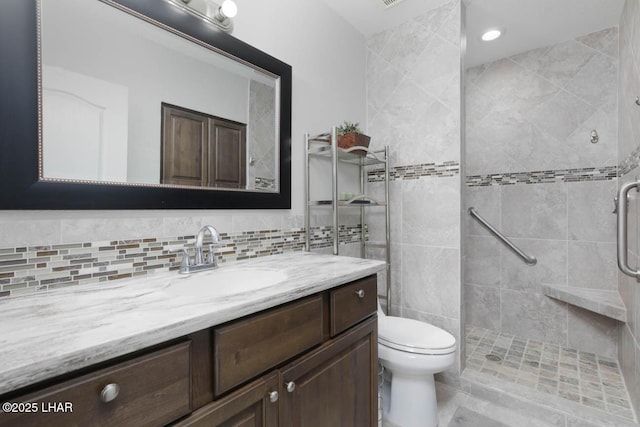 777 Harrah Way Unit 524, Lake Havasu City, AZ 86403 - bathroom featuring vanity, tasteful backsplash, toilet, and walk in shower