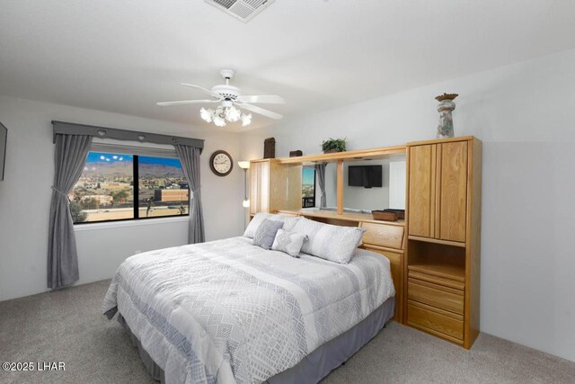 777 Harrah Way Unit 524, Lake Havasu City, AZ 86403 - bedroom featuring light colored carpet and ceiling fan