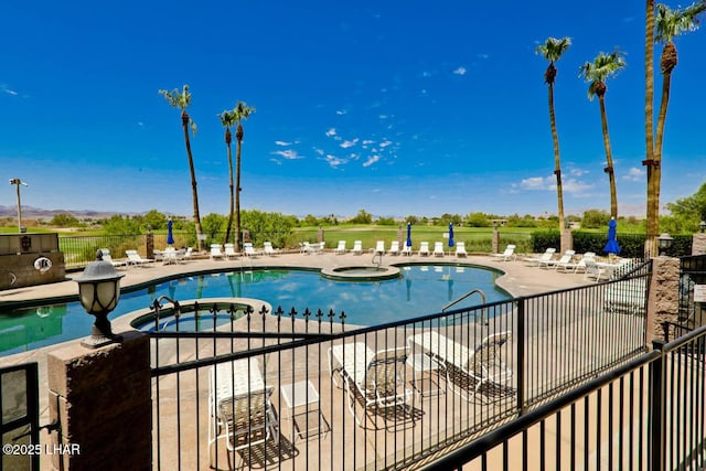 777 Harrah Way Unit 524, Lake Havasu City, AZ 86403 - view of swimming pool featuring a patio and a community hot tub
