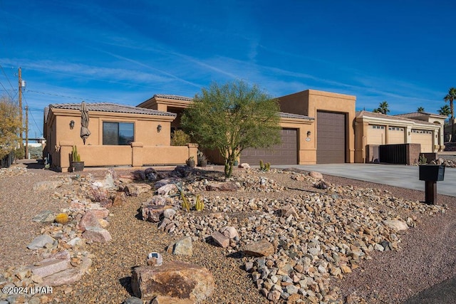 view of front of home with a garage