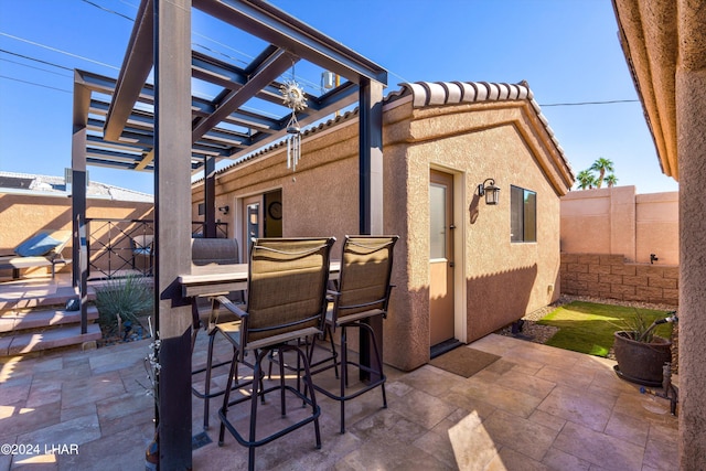 view of patio / terrace featuring a pergola