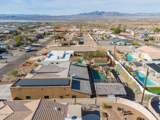 birds eye view of property featuring a mountain view