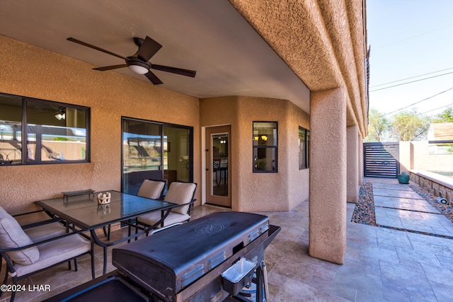 view of patio / terrace with ceiling fan