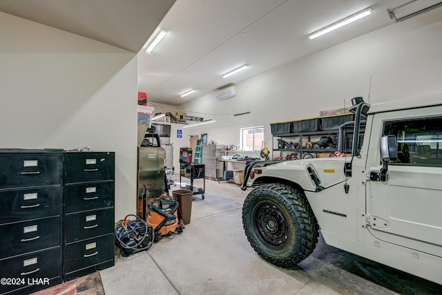 garage featuring a wall unit AC