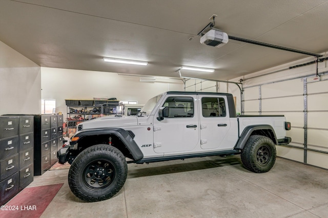 garage featuring a garage door opener