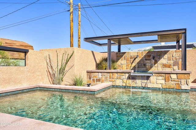 view of swimming pool featuring pool water feature