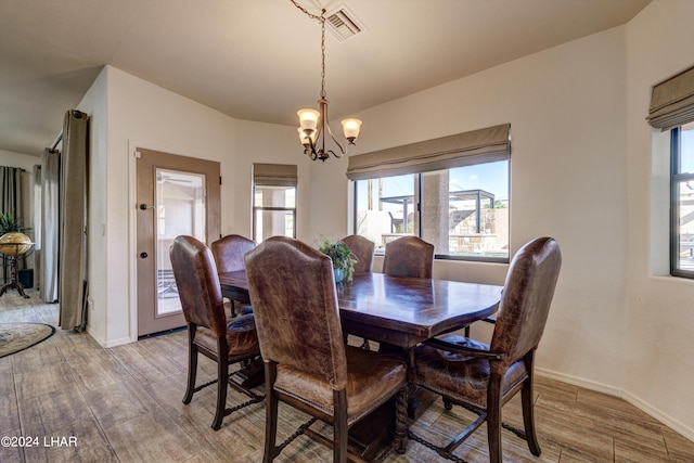 dining area with a chandelier