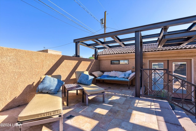 view of patio / terrace with an outdoor living space and a pergola