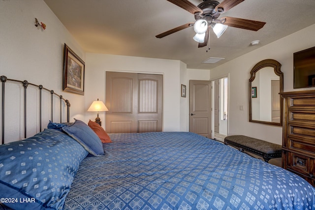 bedroom featuring a closet and ceiling fan