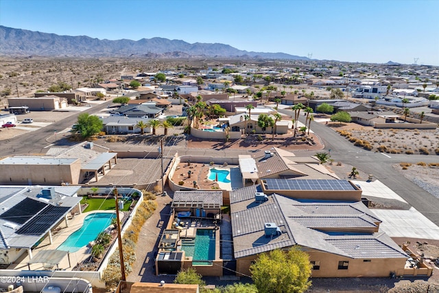 drone / aerial view featuring a mountain view