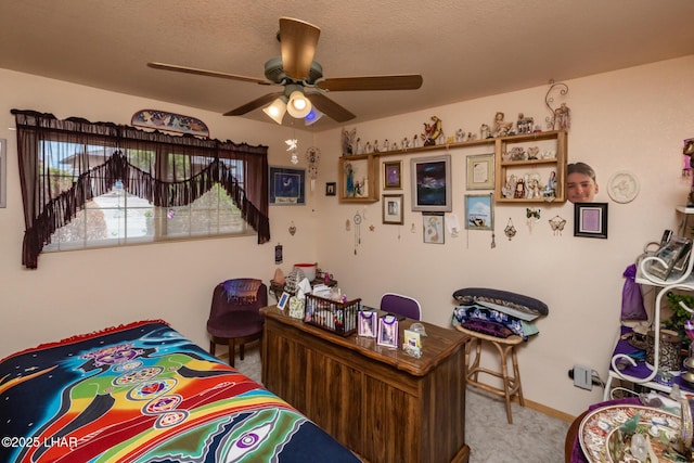 bedroom featuring ceiling fan, carpet, and baseboards