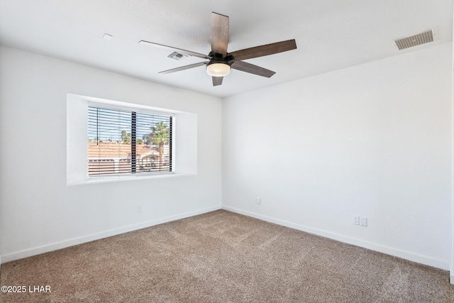 1921 Burgundy Ln, Lake Havasu City, AZ 86404 - empty room featuring carpet flooring, visible vents, a ceiling fan, and baseboards