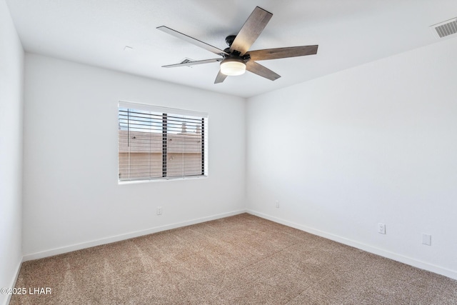 1921 Burgundy Ln, Lake Havasu City, AZ 86404 - carpeted spare room with visible vents, a ceiling fan, and baseboards