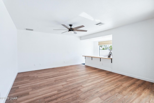 1921 Burgundy Ln, Lake Havasu City, AZ 86404 - empty room featuring ceiling fan, baseboards, visible vents, and light wood-style flooring