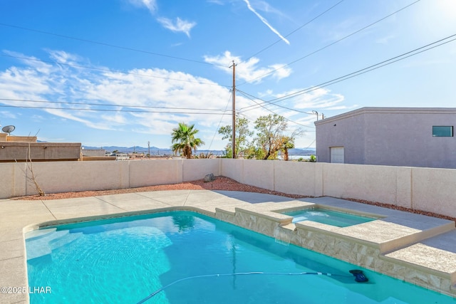 1921 Burgundy Ln, Lake Havasu City, AZ 86404 - view of swimming pool with a fenced backyard, a mountain view, and a pool with connected hot tub