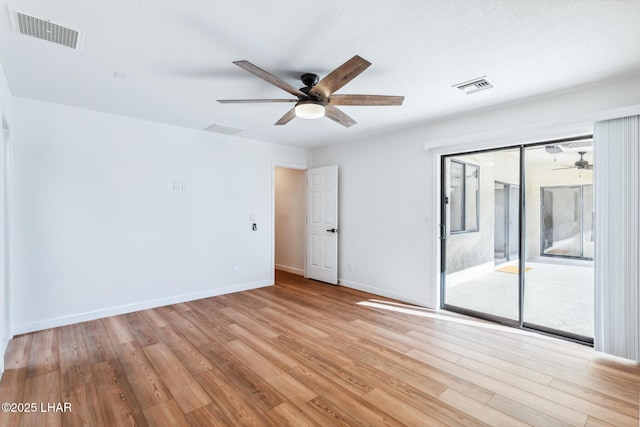 1921 Burgundy Ln, Lake Havasu City, AZ 86404 - spare room featuring a ceiling fan, visible vents, and light wood-style flooring
