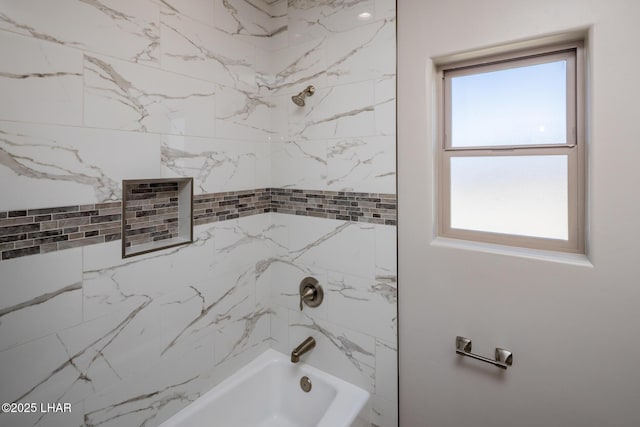 full bathroom featuring a healthy amount of sunlight and  shower combination