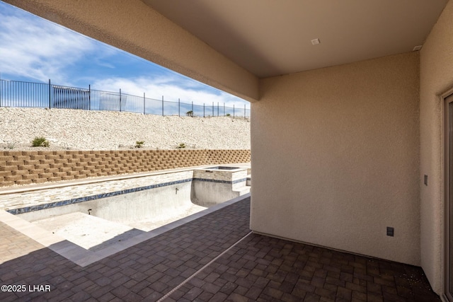 view of patio with fence