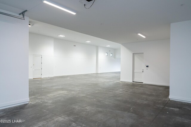 garage featuring baseboards