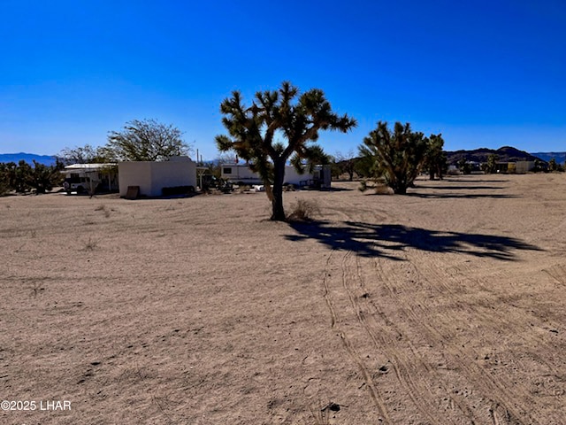 11658 Sherry Rd, Yucca, AZ 86438 - view of yard featuring a mountain view