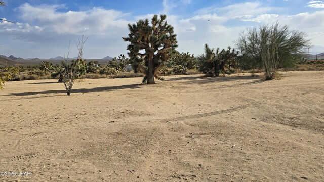 11658 Sherry Rd, Yucca, AZ 86438 - view of yard featuring a mountain view