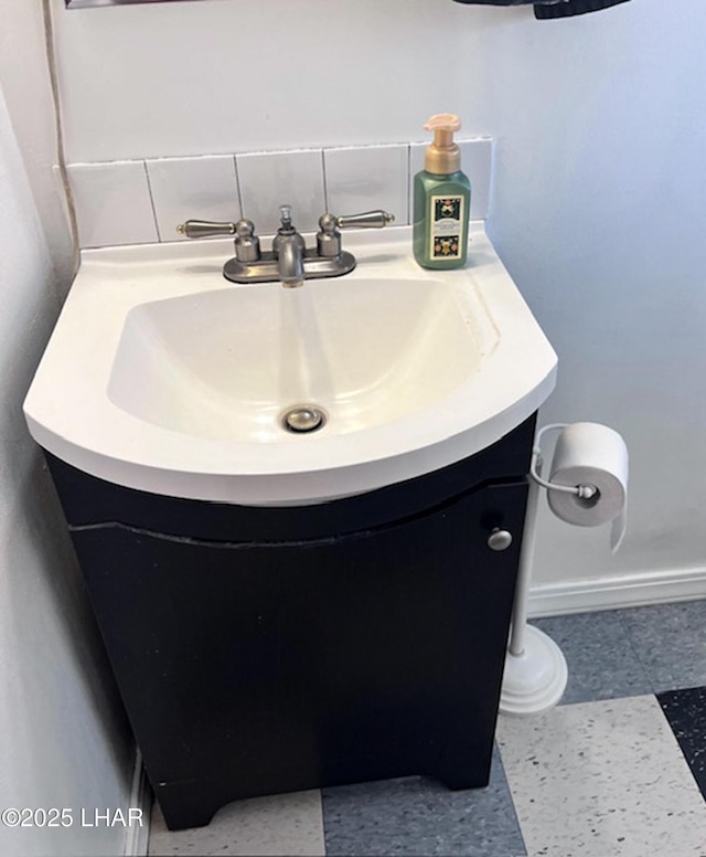 11658 Sherry Rd, Yucca, AZ 86438 - bathroom featuring baseboards and vanity