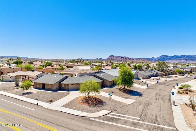 bird's eye view with a mountain view