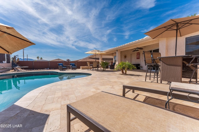 view of pool featuring a fenced in pool, a patio, and fence