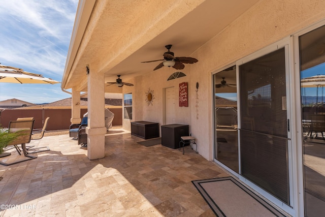 view of patio / terrace featuring a ceiling fan