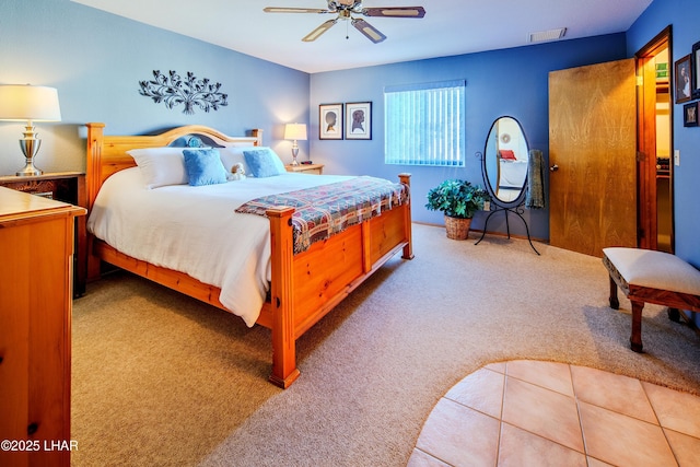 bedroom featuring ceiling fan and carpet flooring