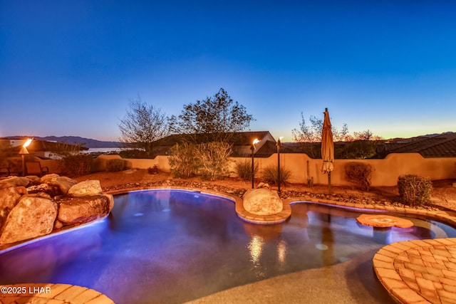 view of pool featuring fence and a fenced in pool