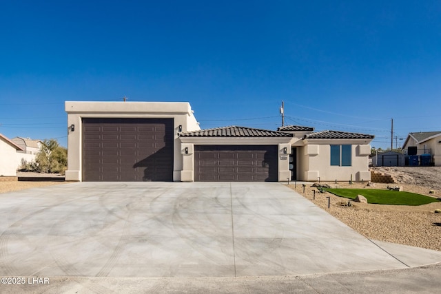 view of front of property with a garage