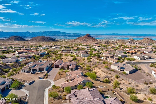 drone / aerial view with a mountain view and a residential view