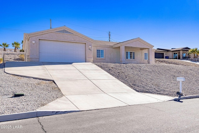 single story home with a garage