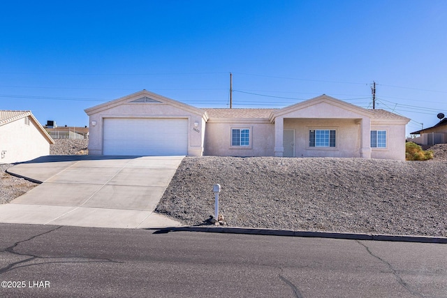 ranch-style house featuring a garage