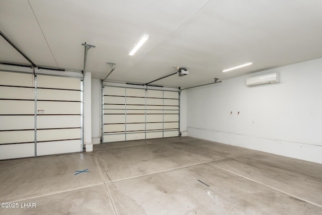 679 Apache Dr, Lake Havasu City, AZ 86406 - garage with a garage door opener and a wall mounted AC