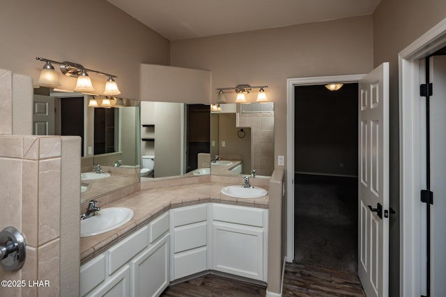 679 Apache Dr, Lake Havasu City, AZ 86406 - full bathroom with wood finished floors and double vanity