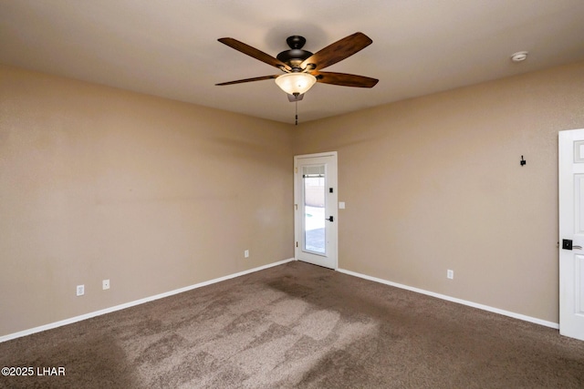 679 Apache Dr, Lake Havasu City, AZ 86406 - spare room with ceiling fan, dark colored carpet, and a smoke detector