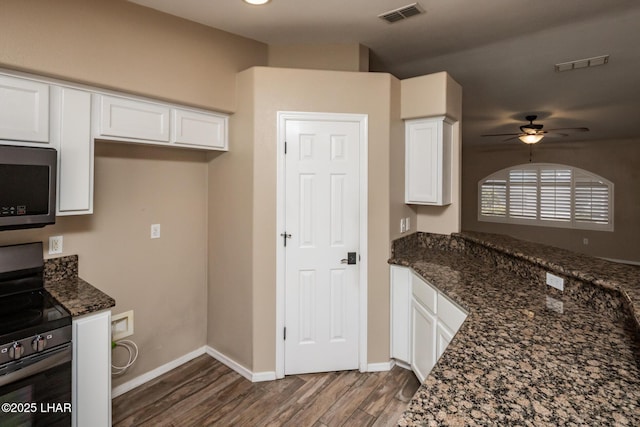 679 Apache Dr, Lake Havasu City, AZ 86406 - kitchen featuring appliances with stainless steel finishes, white cabinets, wood finished floors, and a ceiling fan