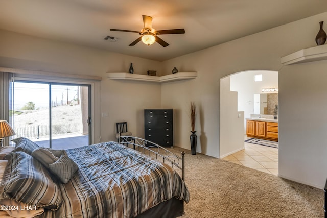 carpeted bedroom with connected bathroom, access to outside, and ceiling fan