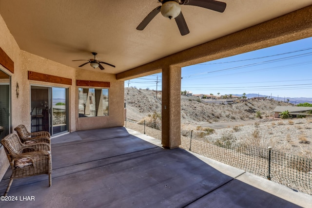 view of patio / terrace featuring ceiling fan