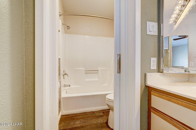 1650 Smoketree Ave Unit 202, Lake Havasu City, AZ 86403 - full bathroom featuring vanity, hardwood / wood-style floors, bathing tub / shower combination, and toilet