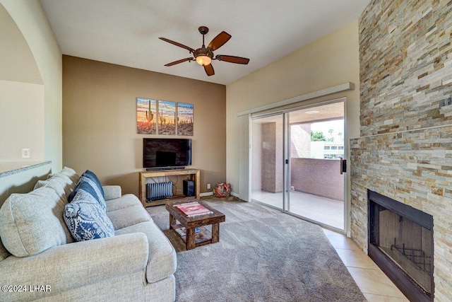 1650 Smoketree Ave Unit 202, Lake Havasu City, AZ 86403 - living room with light tile patterned flooring, ceiling fan, and a fireplace
