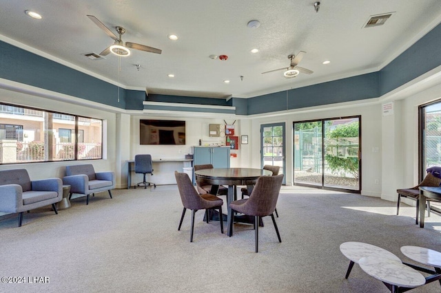 1650 Smoketree Ave Unit 202, Lake Havasu City, AZ 86403 - dining space featuring ornamental molding, light carpet, and ceiling fan
