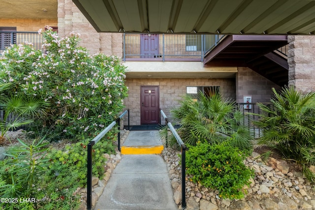 777 Harrah Way Unit 112, Lake Havasu City, AZ 86403 - doorway to property featuring stone siding and a balcony