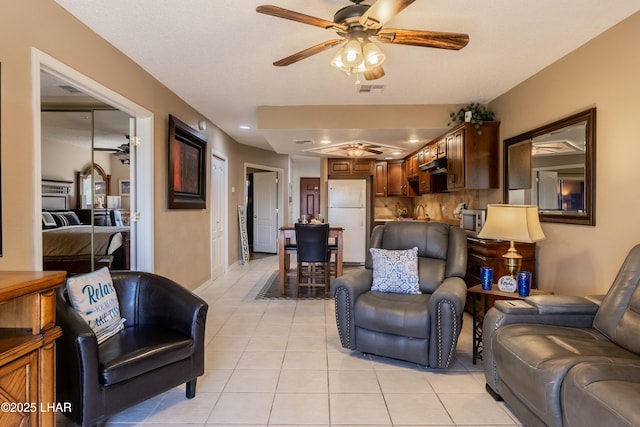 777 Harrah Way Unit 112, Lake Havasu City, AZ 86403 - living room with baseboards, recessed lighting, light tile patterned floors, visible vents, and ceiling fan