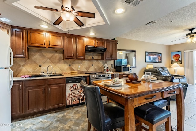 777 Harrah Way Unit 112, Lake Havasu City, AZ 86403 - kitchen featuring freestanding refrigerator, a ceiling fan, under cabinet range hood, dishwasher, and a sink