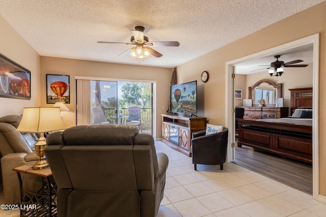 777 Harrah Way Unit 112, Lake Havasu City, AZ 86403 - living area featuring light tile patterned floors, ceiling fan, and a textured ceiling
